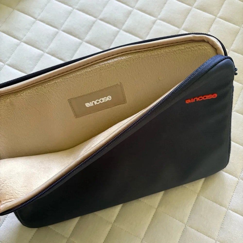 Incase Dark Blue Laptop Sleeve with Orange Logo